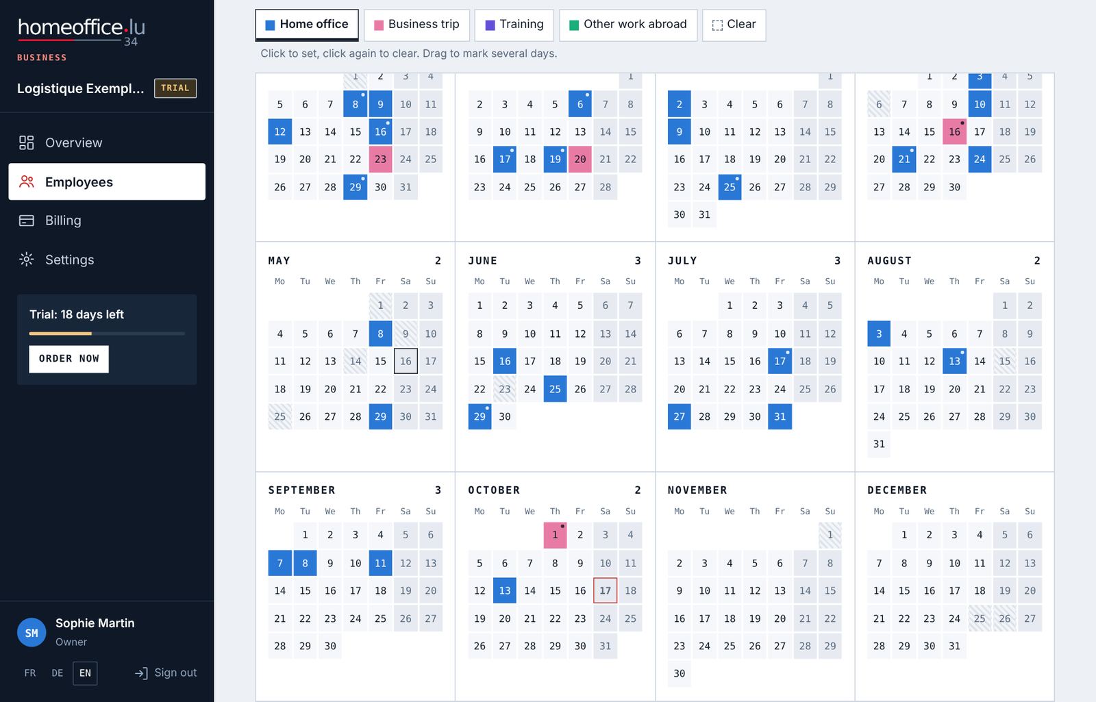The year calendar. Days recorded by the employee carry a dot.